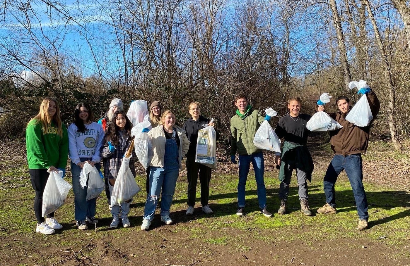 Volunteers picked up trash along the Willamette riverbank